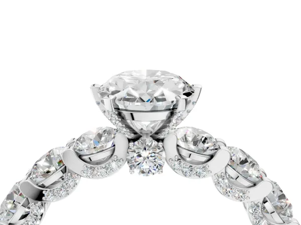 Oval Cut Diamond Side Stone Engagement Ring with Four-Prong Setting White gold