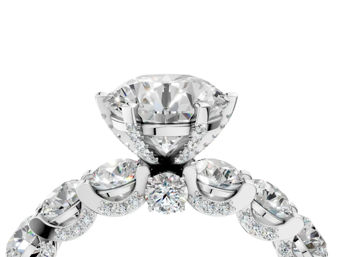 Round Cut Diamond Side Stone Engagement Ring with Four-Prong Setting White gold