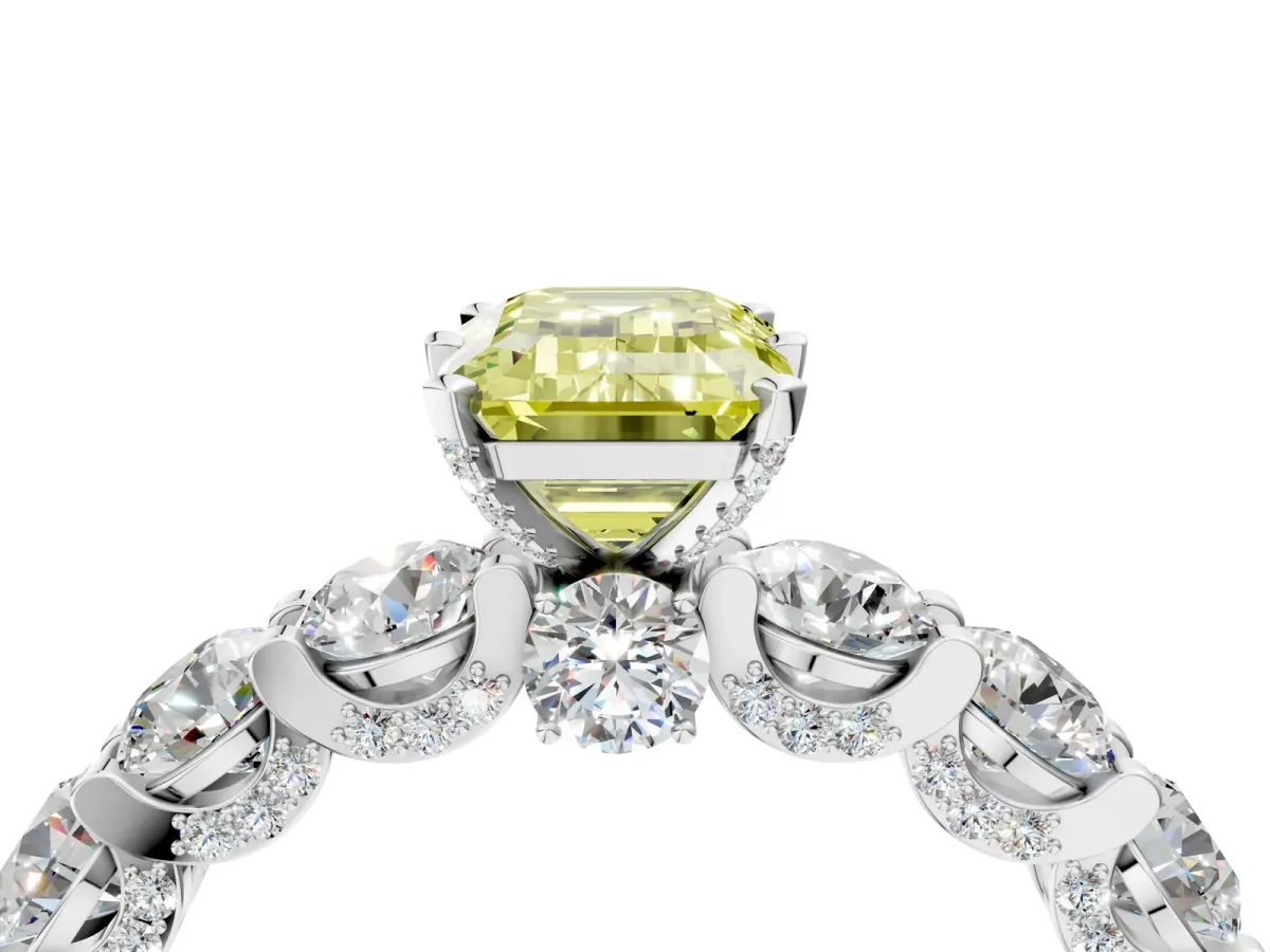 Fancy Yellow Emerald Cut Diamond Side Stone Engagement Ring with Four-Prong Setting White gold