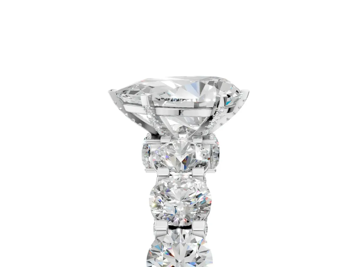Pear Cut Diamond Side Stone Engagement Ring with Four-Prong Setting White gold