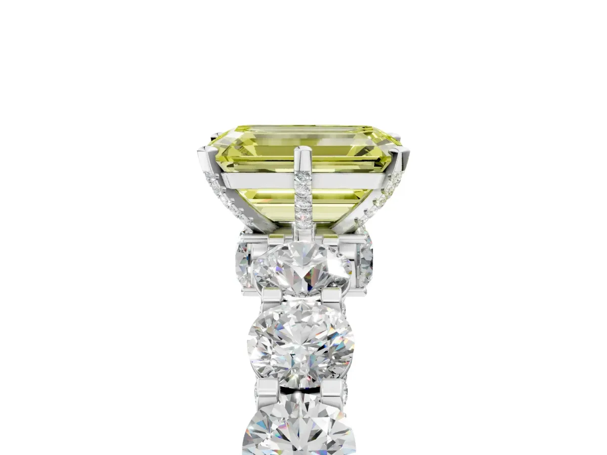 Fancy Yellow Emerald Cut Diamond Side Stone Engagement Ring with Four-Prong Setting White gold