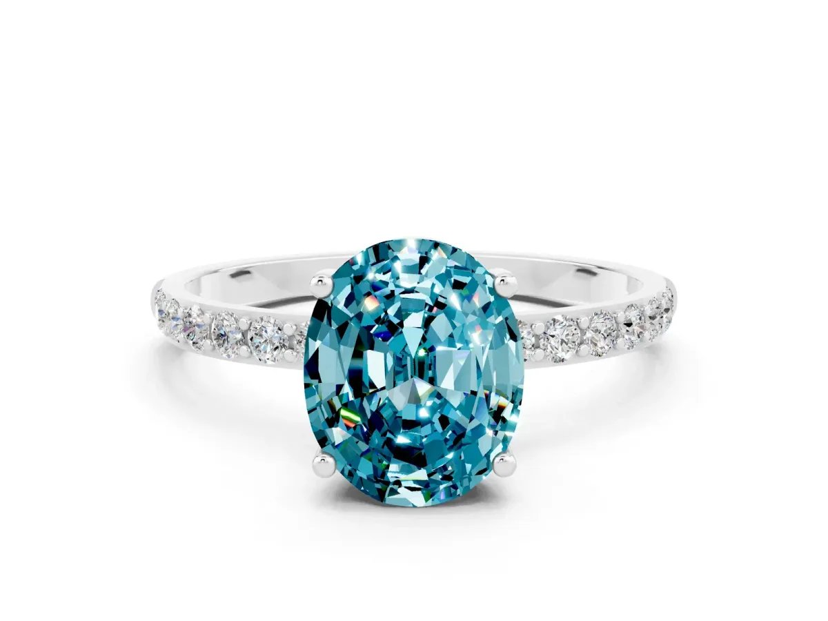 Oval Cut Blue Topaz Solitaire Ring with Round Pavé Band and Prong Setting Silver