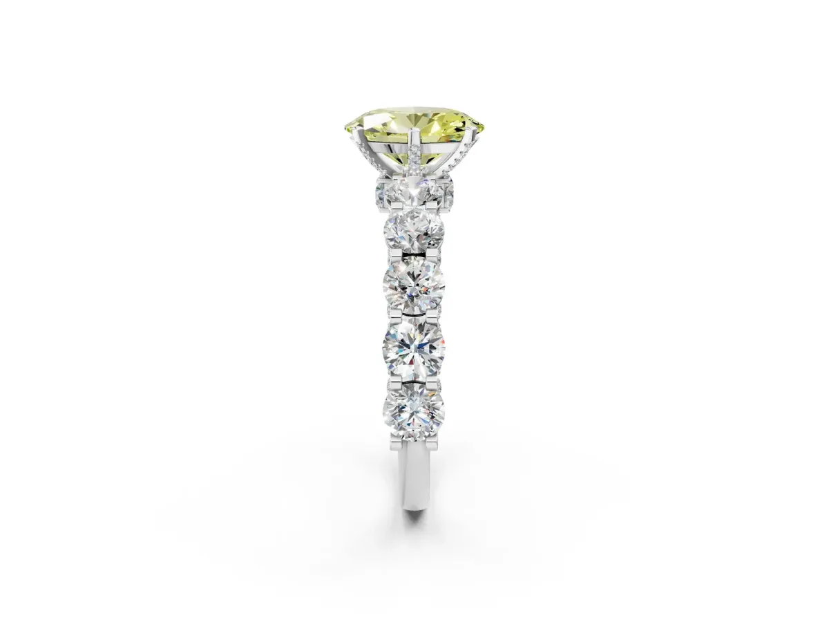 Fancy Yellow Oval Cut Diamond Side Stone Engagement Ring with Four-Prong Setting Silver
