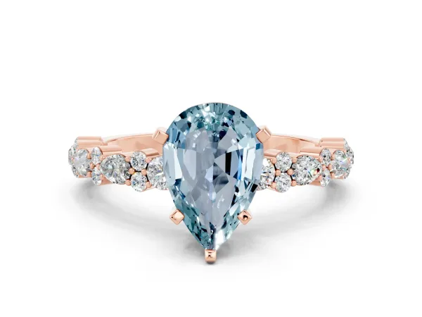 Pear Cut Aquamarine Side Stone Solitaire Ring with Round and Four-Prong Setting Rose gold