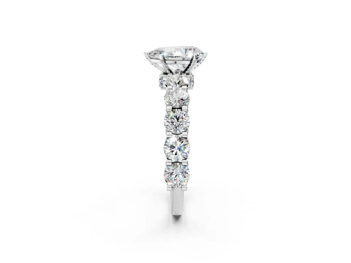 Pear Cut Diamond Side Stone Engagement Ring with Four-Prong Setting White gold