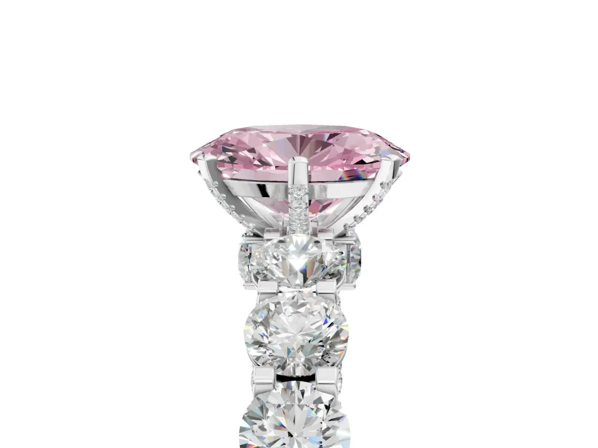 Fancy Pink Oval Cut Diamond Side Stone Engagement Ring with Four-Prong Setting Platinum