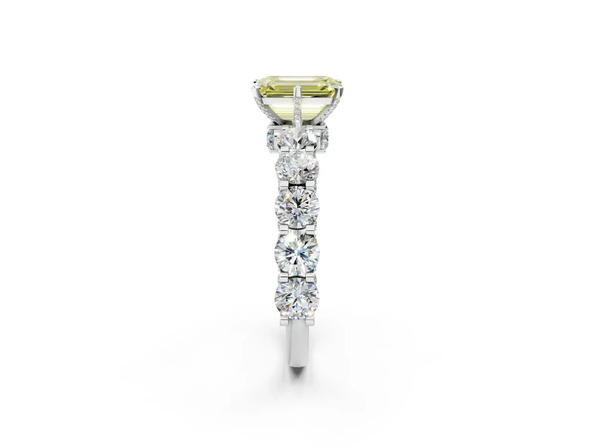 Fancy Yellow Emerald Cut Diamond Side Stone Engagement Ring with Four-Prong Setting White gold