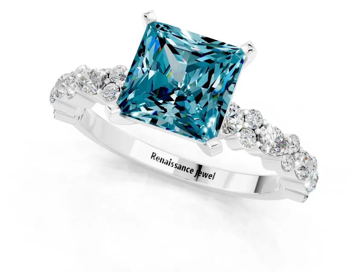 Princess Cut Blue Topaz Side Stone Solitaire Ring with Round and Four-Prong Setting Platinum