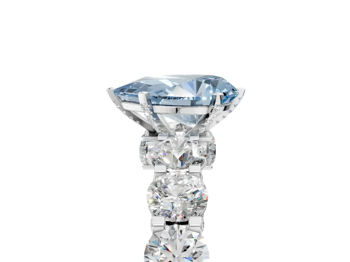 Fancy Blue Pear Cut Diamond Side Stone Engagement Ring with Four-Prong Setting White gold