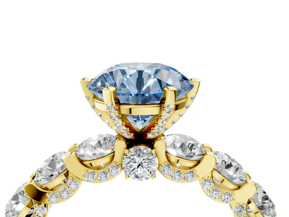Fancy Blue Round Cut Diamond Side Stone Engagement Ring with Four-Prong Setting Yellow gold