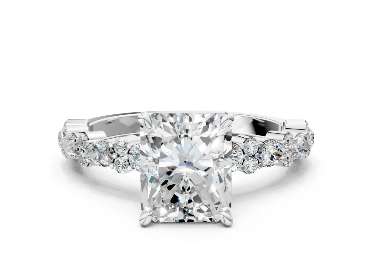 Radiant Cut Diamond Side Stone Solitaire Ring with Round and Four-Prong Setting Platinum
