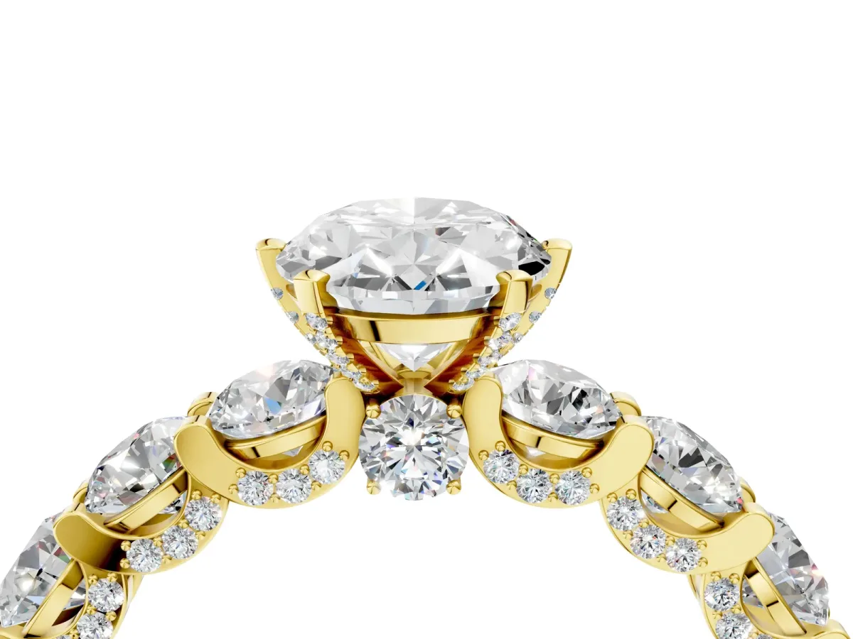 Oval Cut Diamond Side Stone Engagement Ring with Four-Prong Setting Yellow gold