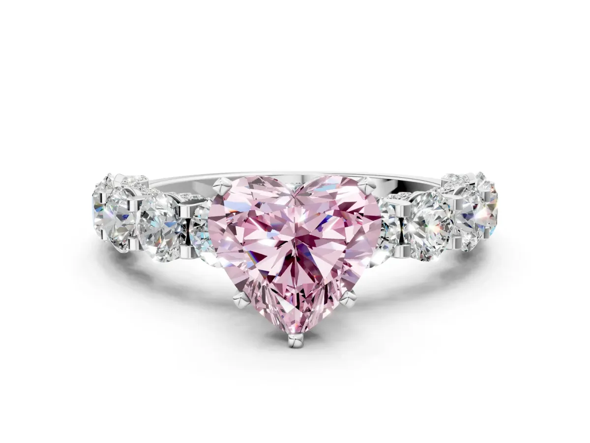 Fancy Pink Heart Cut Diamond Side Stone Engagement Ring with Four-Prong Setting Silver