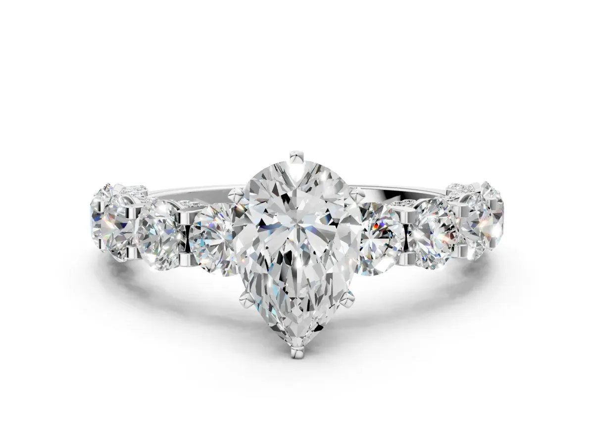 Pear Cut Diamond Side Stone Engagement Ring with Four-Prong Setting White gold