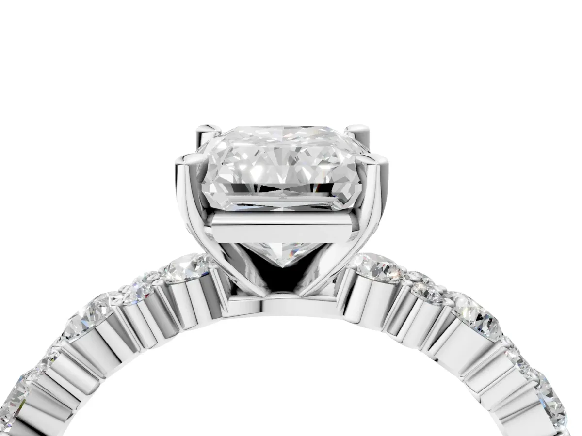 Radiant Cut Diamond Side Stone Solitaire Ring with Round and Four-Prong Setting Platinum