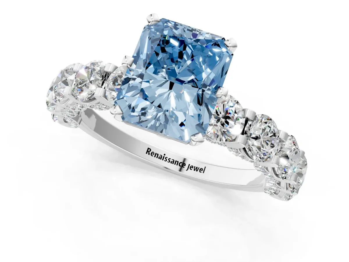 Fancy Blue Radiant Cut Diamond Side Stone Engagement Ring with Four-Prong Setting Platinum