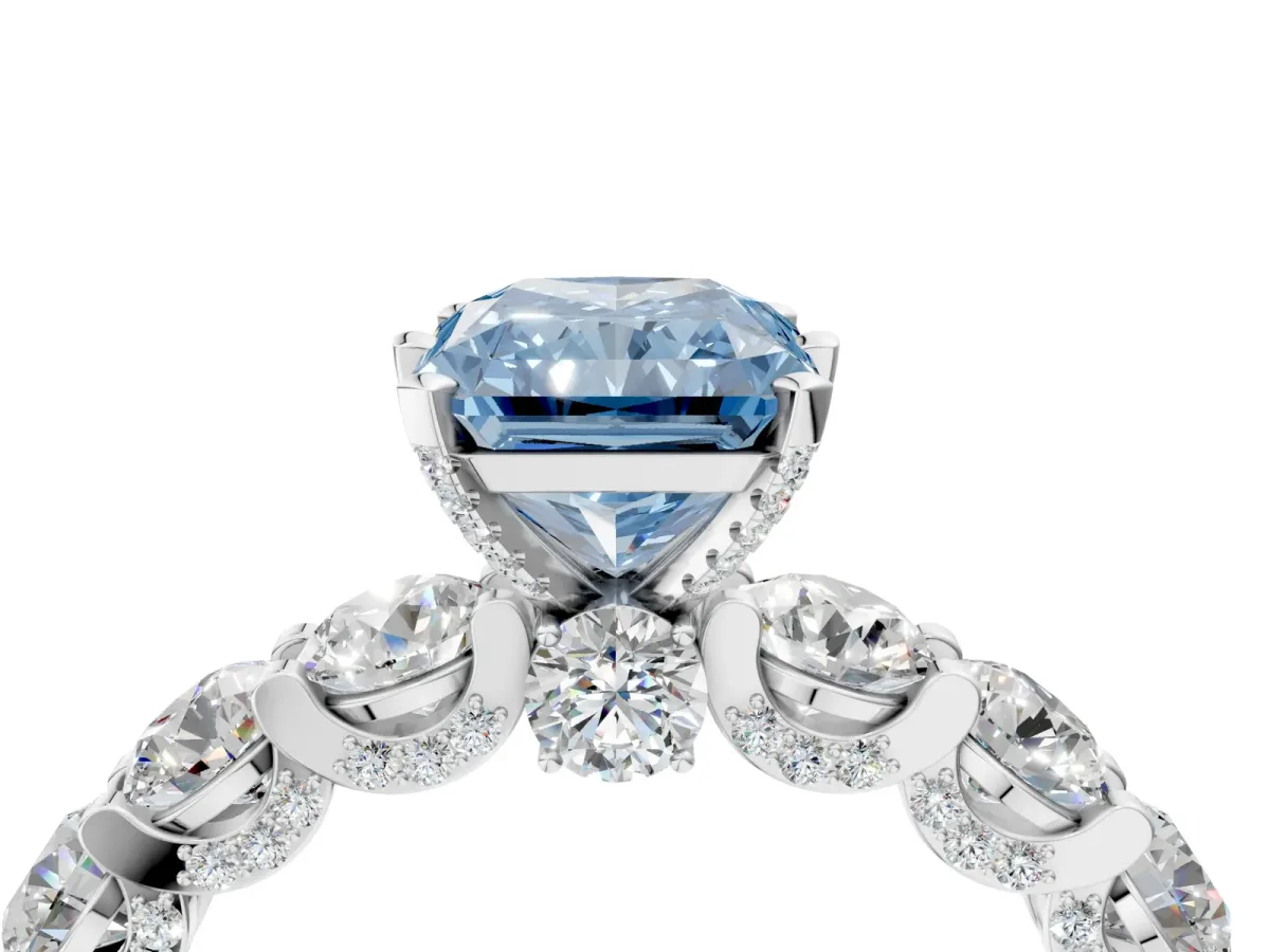 Fancy Blue Radiant Cut Diamond Side Stone Engagement Ring with Four-Prong Setting Platinum