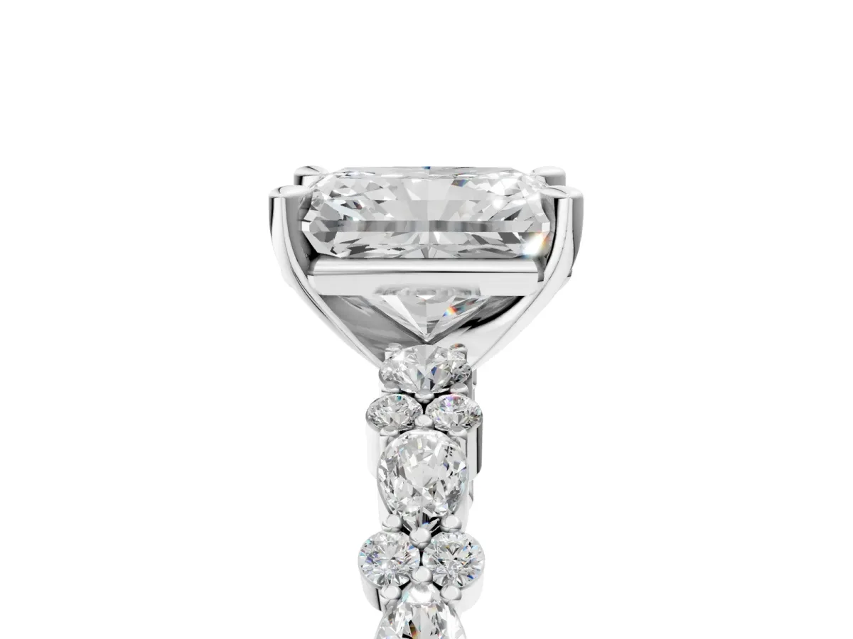 Radiant Cut Diamond Side Stone Solitaire Ring with Round and Four-Prong Setting Platinum