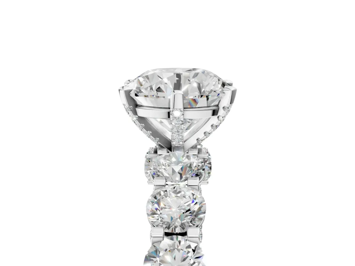 Round Cut Diamond Side Stone Engagement Ring with Four-Prong Setting White gold