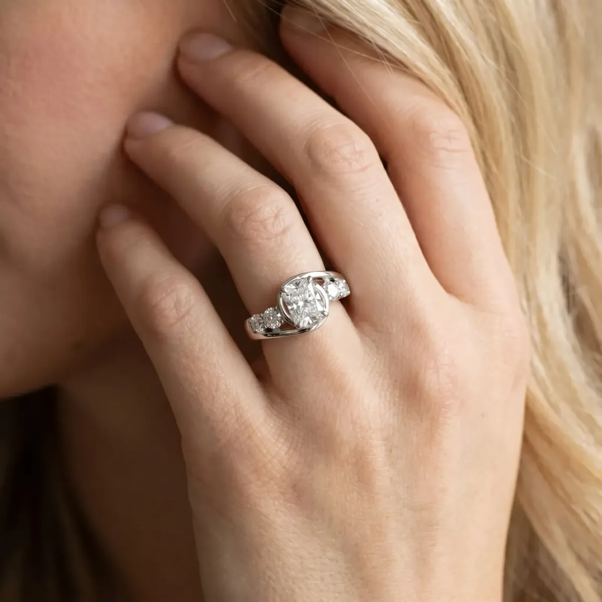 Bezel Set Radiant Cut Diamond Bypass Ring with Round Accents Platinum