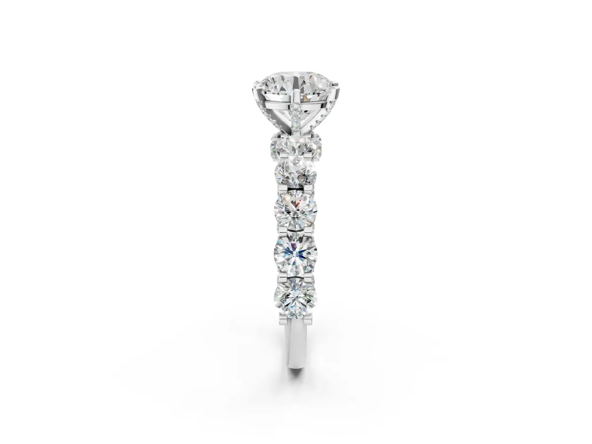 Round Cut Diamond Side Stone Engagement Ring with Four-Prong Setting White gold