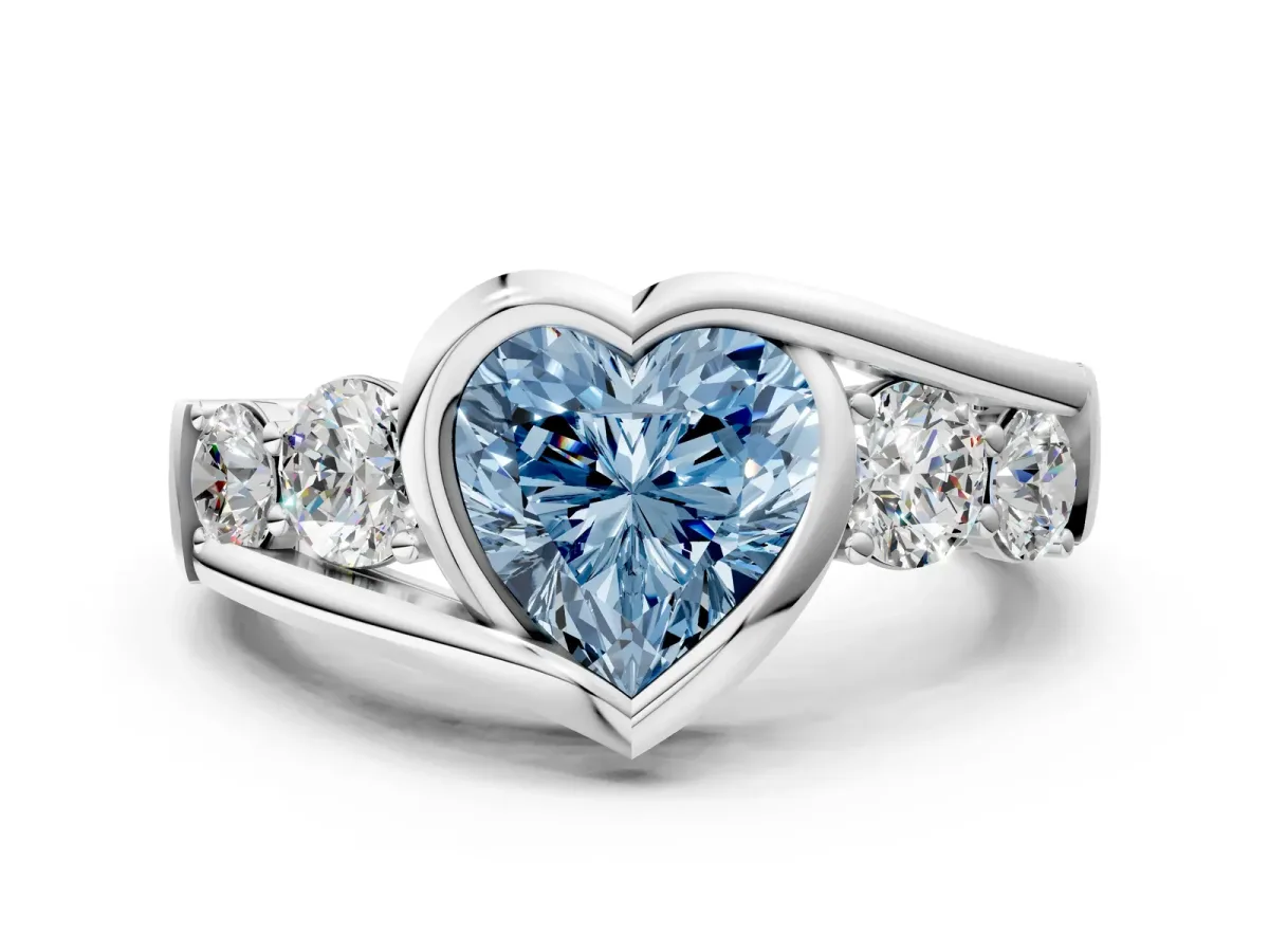Fancy Blue Bezel Set Heart Cut Diamond Bypass Ring with Round Accents Platinum