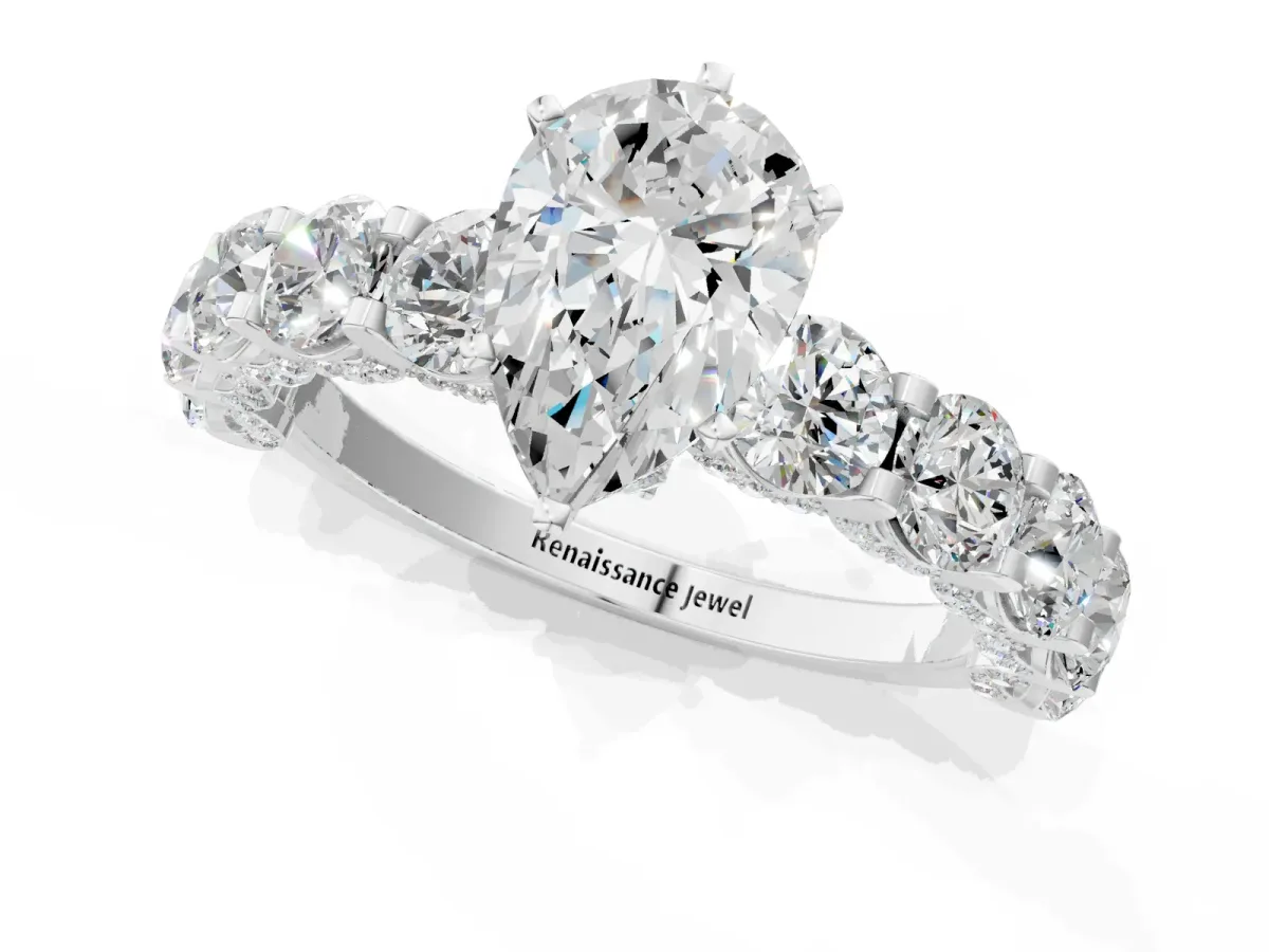 Pear Cut Diamond Side Stone Engagement Ring with Four-Prong Setting White gold