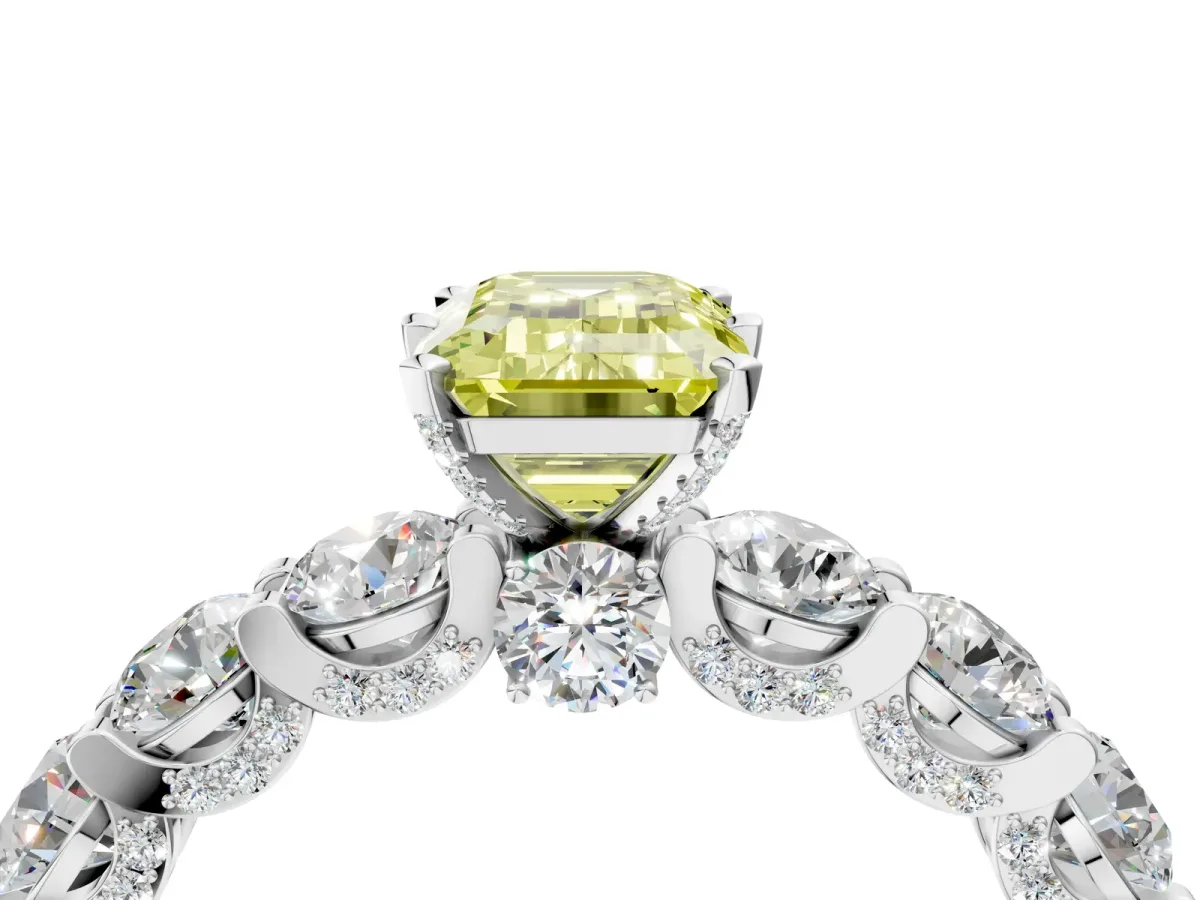 Fancy Yellow Emerald Cut Diamond Side Stone Engagement Ring with Four-Prong Setting White gold