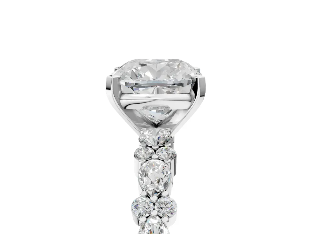 Cushion Cut Diamond Side Stone Solitaire Ring with Round and Four-Prong Setting Platinum