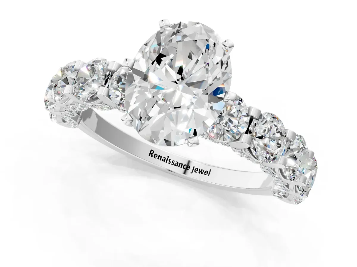 Oval Cut Diamond Side Stone Engagement Ring with Four-Prong Setting White gold