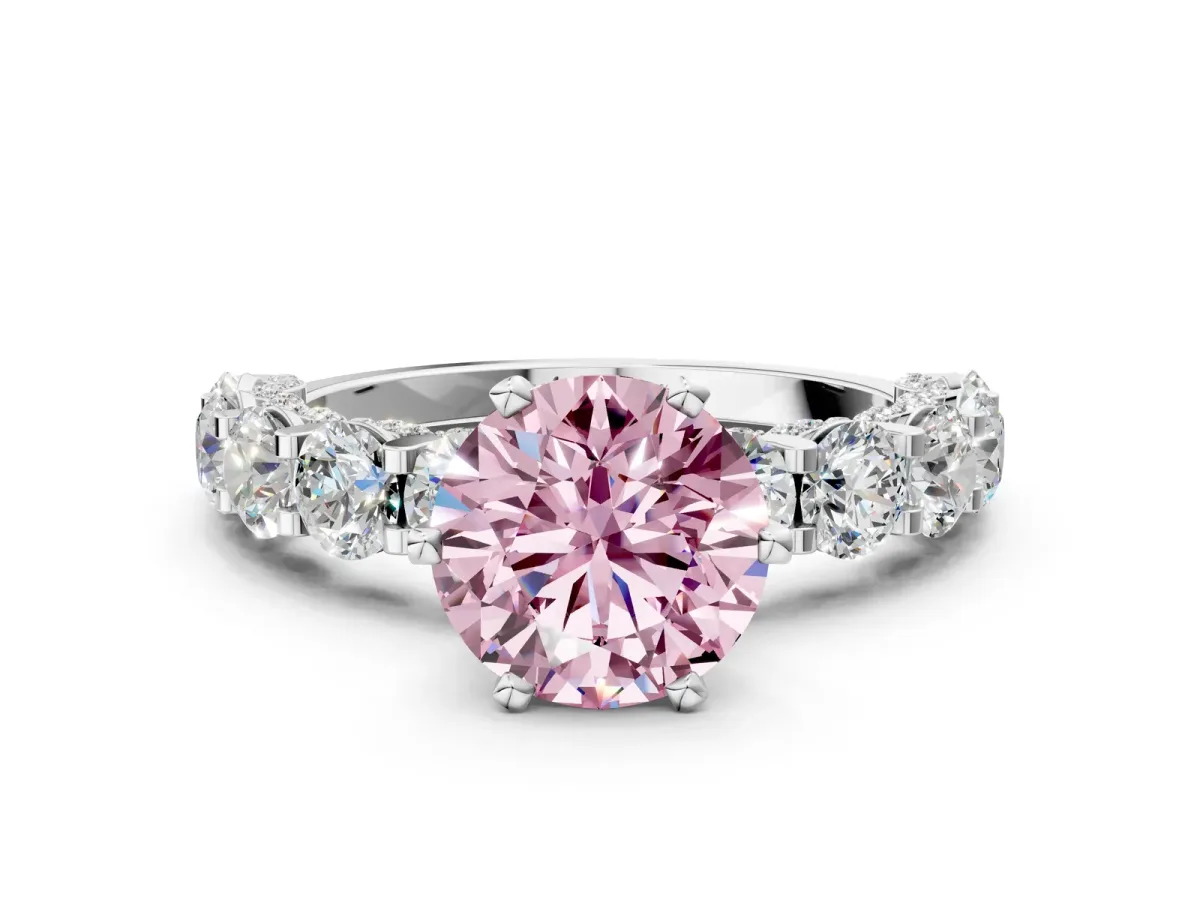 Fancy Pink Round Cut Diamond Side Stone Engagement Ring with Four-Prong Setting White gold
