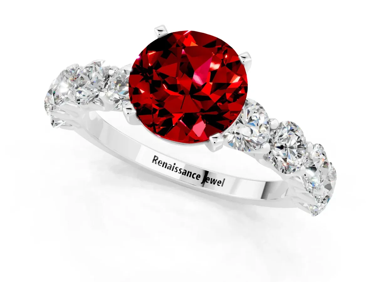 Round Cut Ruby Prong Setting with Side Stones on a Pave Band Silver