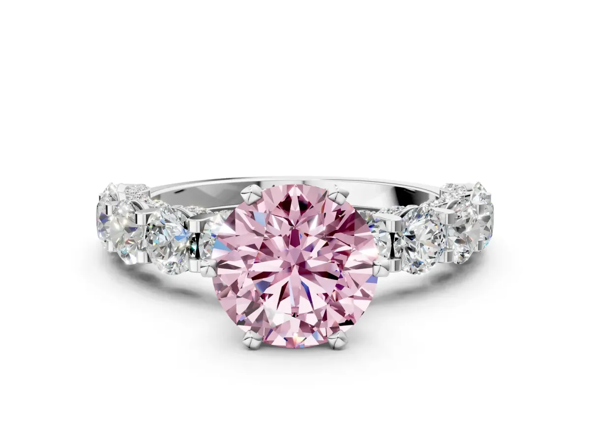 Fancy Pink Round Cut Diamond Side Stone Engagement Ring with Four-Prong Setting White gold