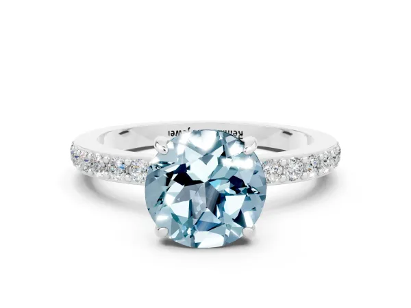 Round Cut Aquamarine Solitaire Engagement Ring with Pavé Band and Four-Prong Setting Platinum