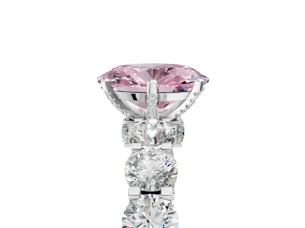 Fancy Pink Oval Cut Diamond Side Stone Engagement Ring with Four-Prong Setting Platinum