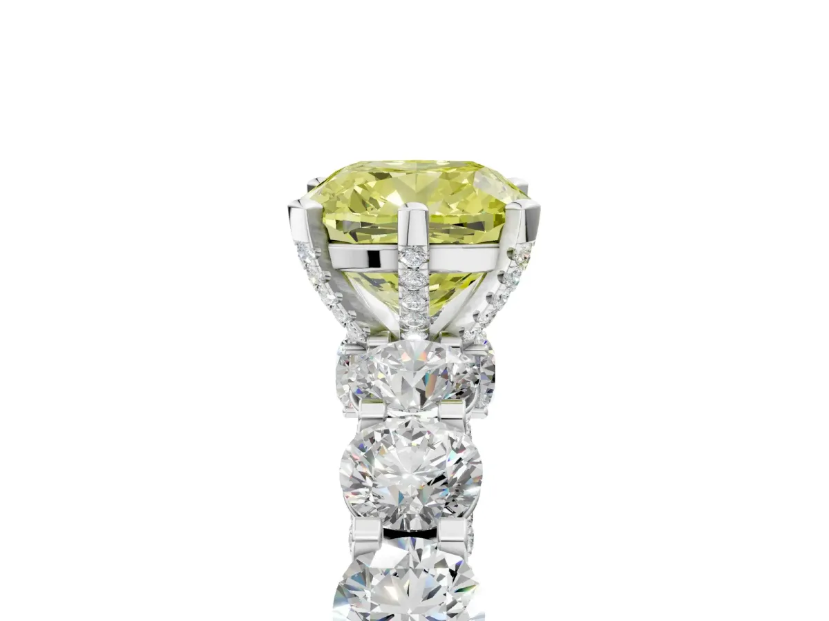 Fancy Yellow Cushion Cut Diamond Side Stone Engagement Ring with Four-Prong Setting Platinum