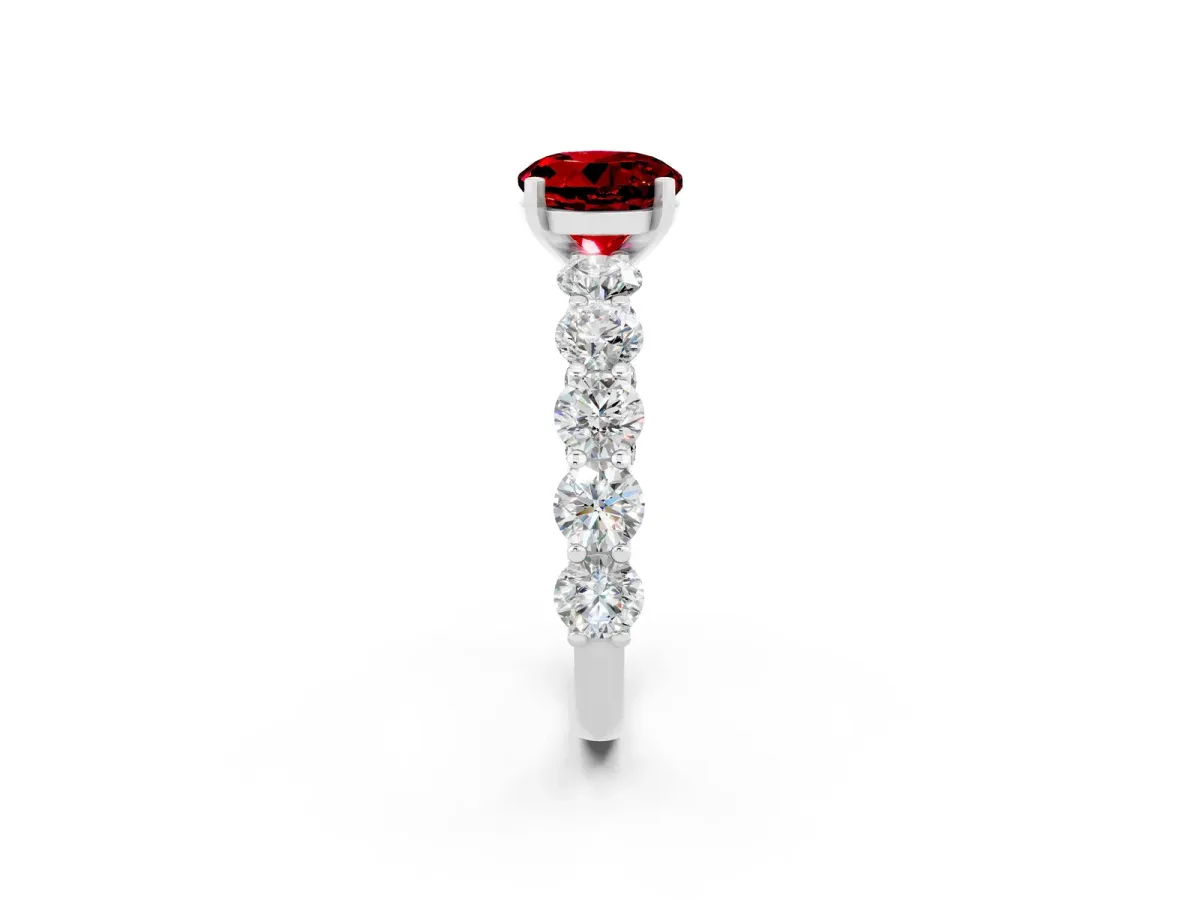 Round Cut Ruby Prong Setting with Side Stones on a Pave Band Silver